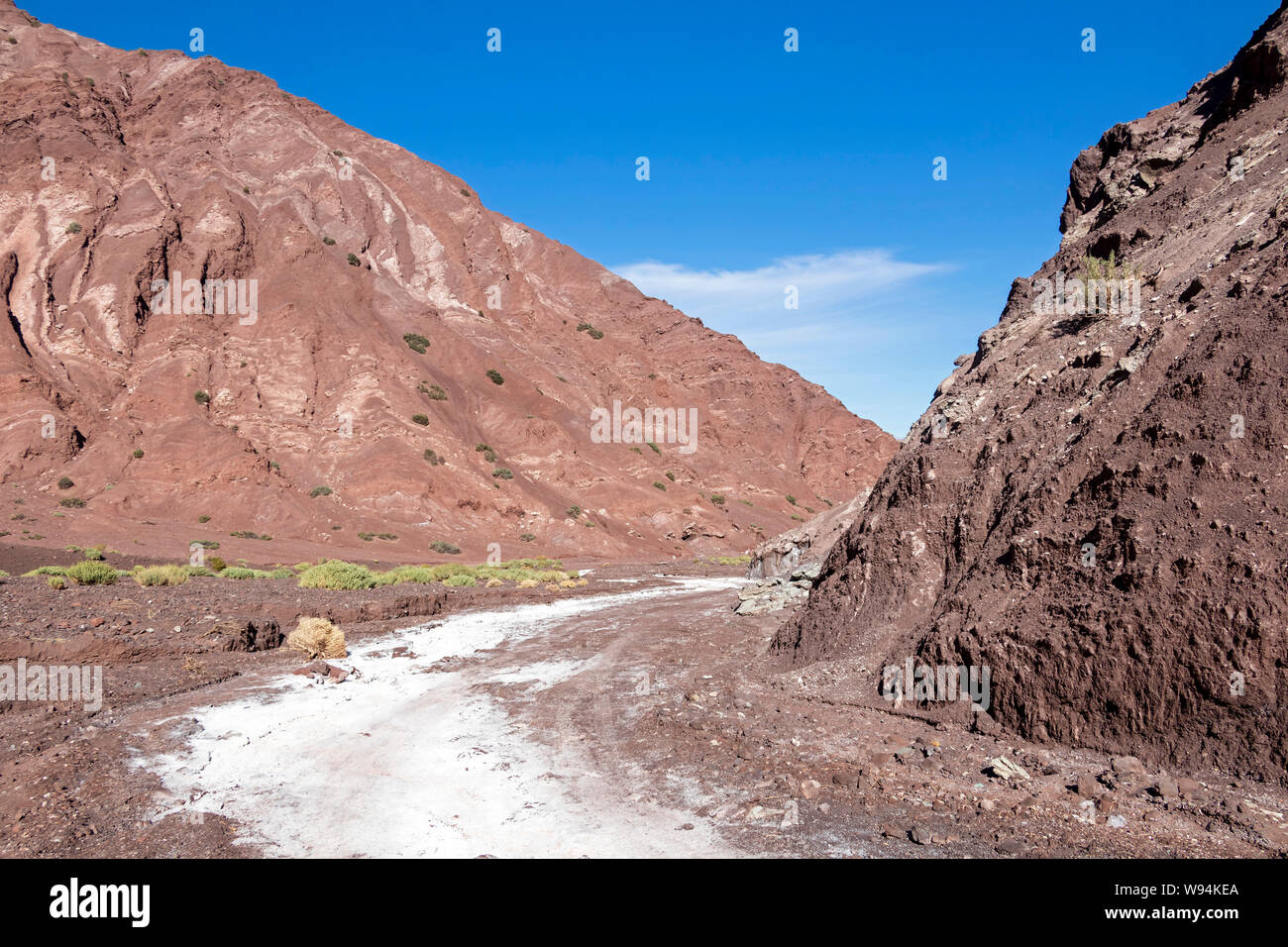 Rainbow Valley or Valle de Arcoiris in San Pedro de Atacama that stands out for the color of its reddish, beige, green and white earth Stock Photo