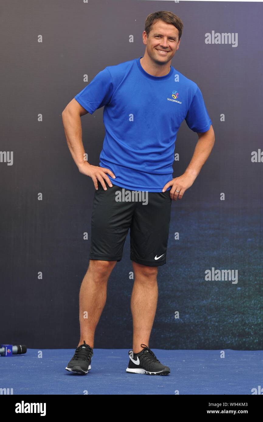 English soccer star Michael Owen poses at a promotional event of