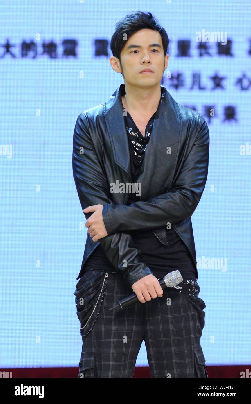 Taiwanese singer and actor Jay Chou smiles during an event, We are together,organised in Beijing to send warm wishes to the victims of the earthquake Stock Photo