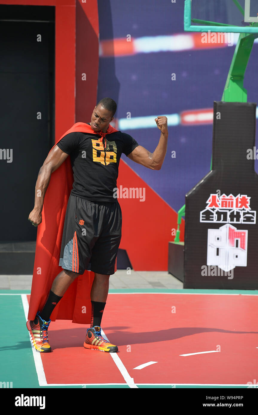 NBA star Dwight Howard of the Houston Rockets basketball team poses during a promotional event Nike in Chengdu, southwest Chinas province Stock Photo -