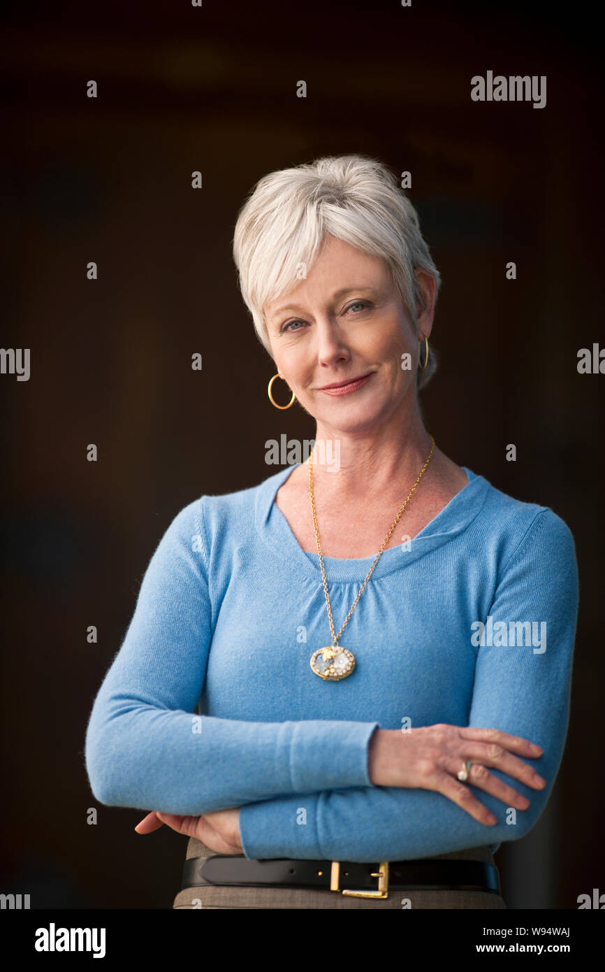 Portrait of a contented mature businesswoman Stock Photo - Alamy