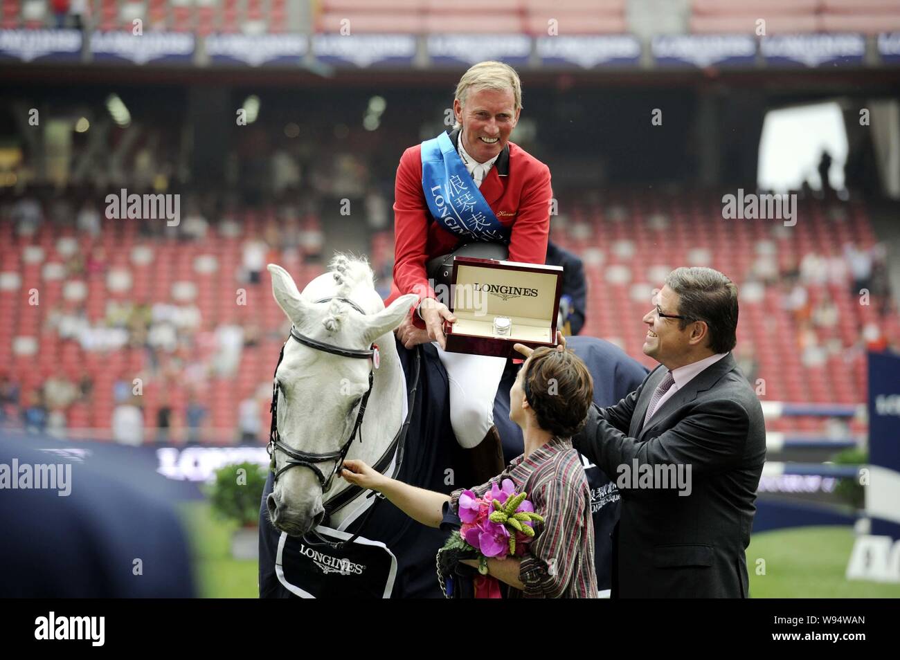 Belgian Jos Lansink wins the champion of 2012 Longines Equestrian