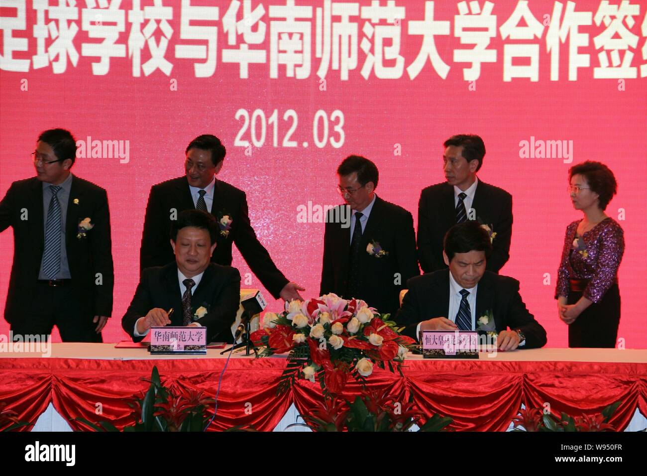 Officials From Chinas Guangzhou Evergrande Are Pictured During A