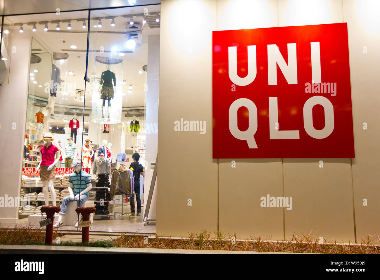 File--View of a Uniqlo store in Shanghai, China, 9 April 2012. Since  opening its first Shanghai store in 2002, Japanese clothing retailer Uniqlo  h Stock Photo - Alamy