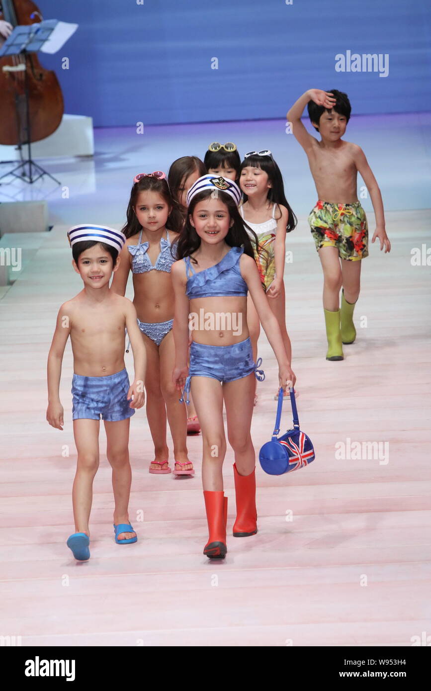 Models present creations from the Aimer Kids 2012 swimwear collection  during the China Fashion Week in Beijing, China, 31 March 2012 Stock Photo  - Alamy