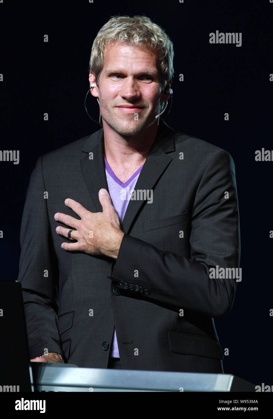 A member of Danish rock band Michael Learns to Rock, also known as MLTR, performs at the opening gala of the 2012 Nanning International Folk Song Arts Stock Photo