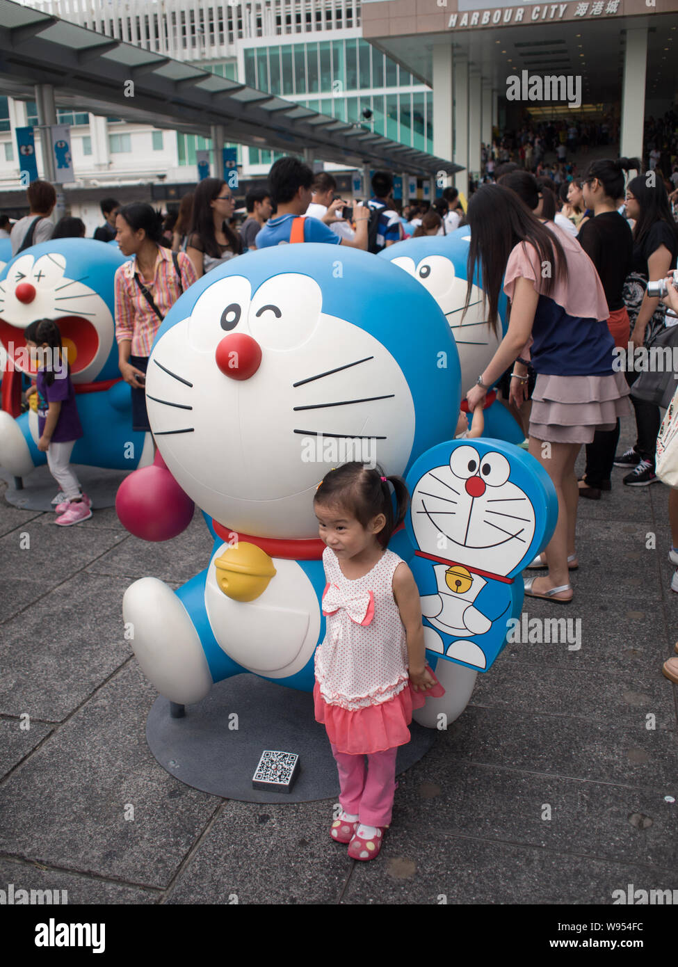 Citizens view models of Doraemon, a famous Japanese cartoon character