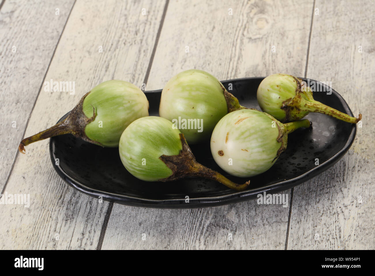 Asian small green eggplant ready for cooking Stock Photo Alamy