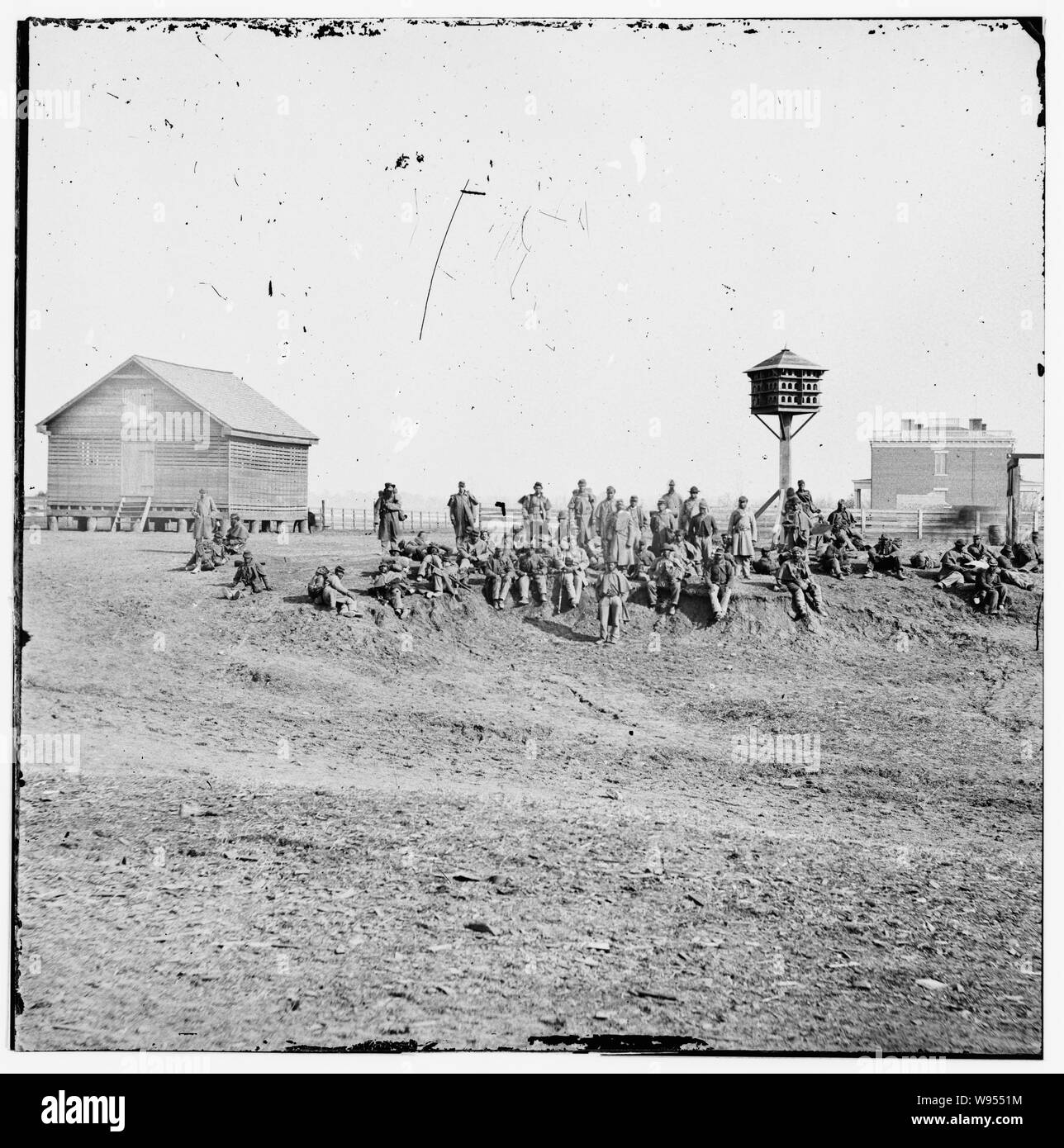Aiken's Landing, Va.  African-American soldiers resting near the Aiken house, view looking toward the house Abstract: Selected Civil War photographs, 1861-1865 (Library of Congress) Stock Photo