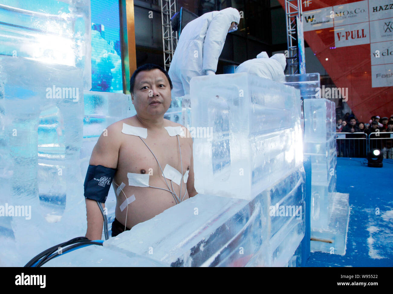 Chinese man Wang Baoyu stands in an ice cabin before the Iceman competion a...