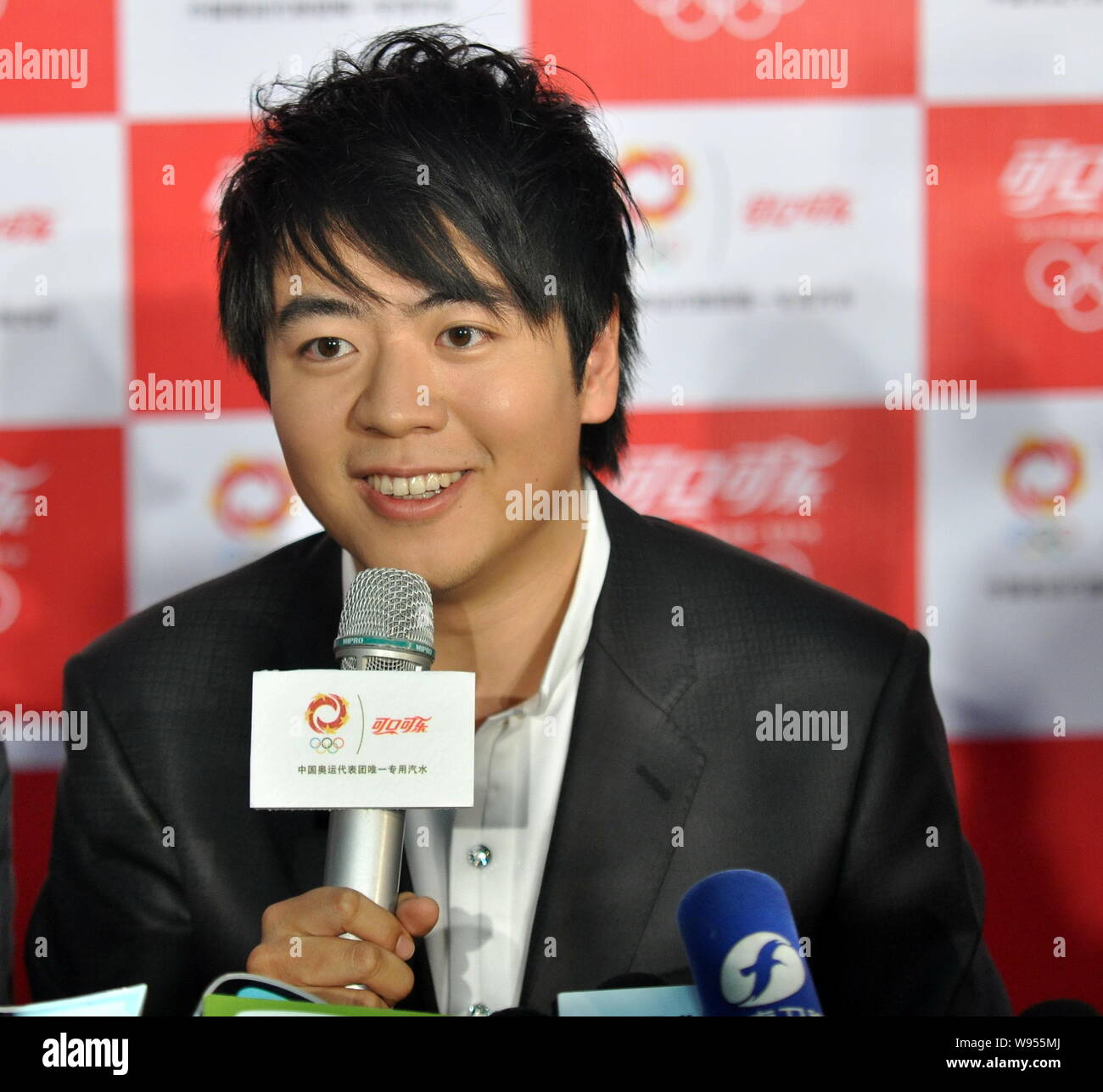 Chinese pianist Lang Lang attends a press conference after a ceremony