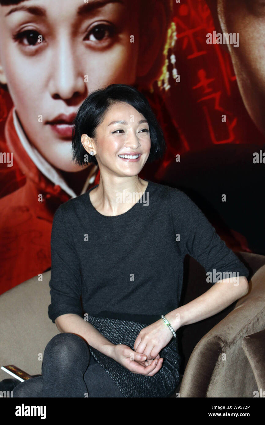 Chinese actress Zhou Xun grins during a press conference for the new ...
