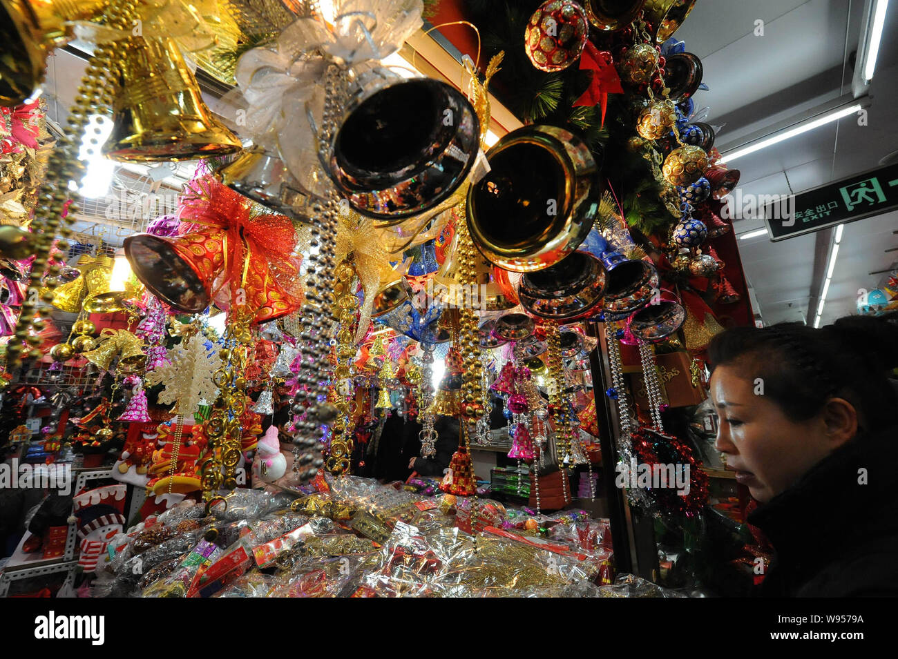 Chinese Customers Buy Christmas Decorations In A Shop At A