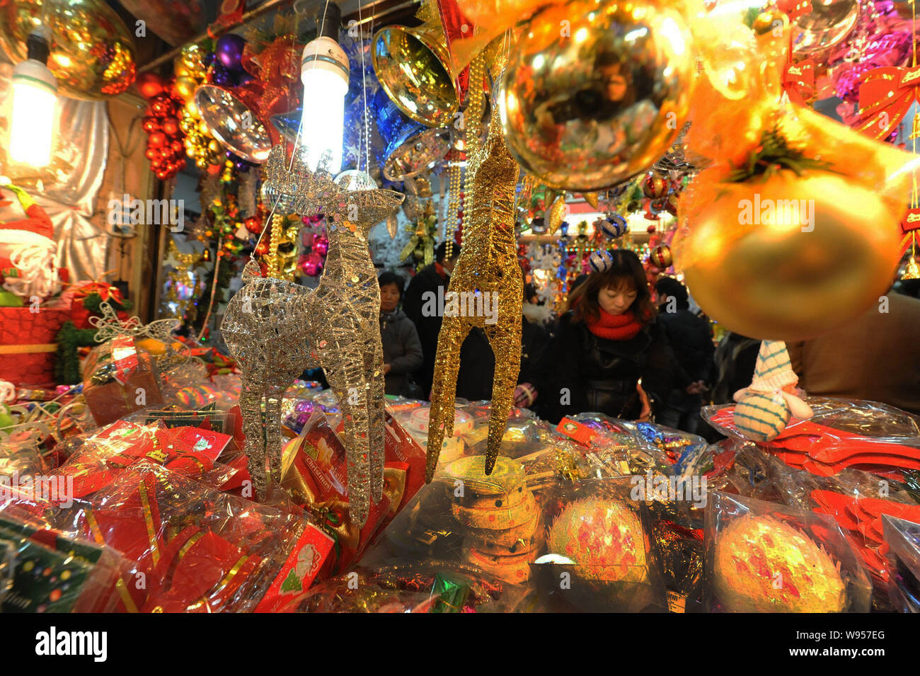 Chinese Customers Buy Christmas Decorations In A Shop At A