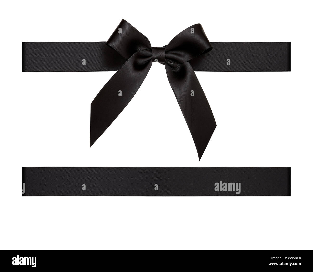 Black ribbon bow cut out and isolated on white background, black gift box ribbon decor Stock Photo