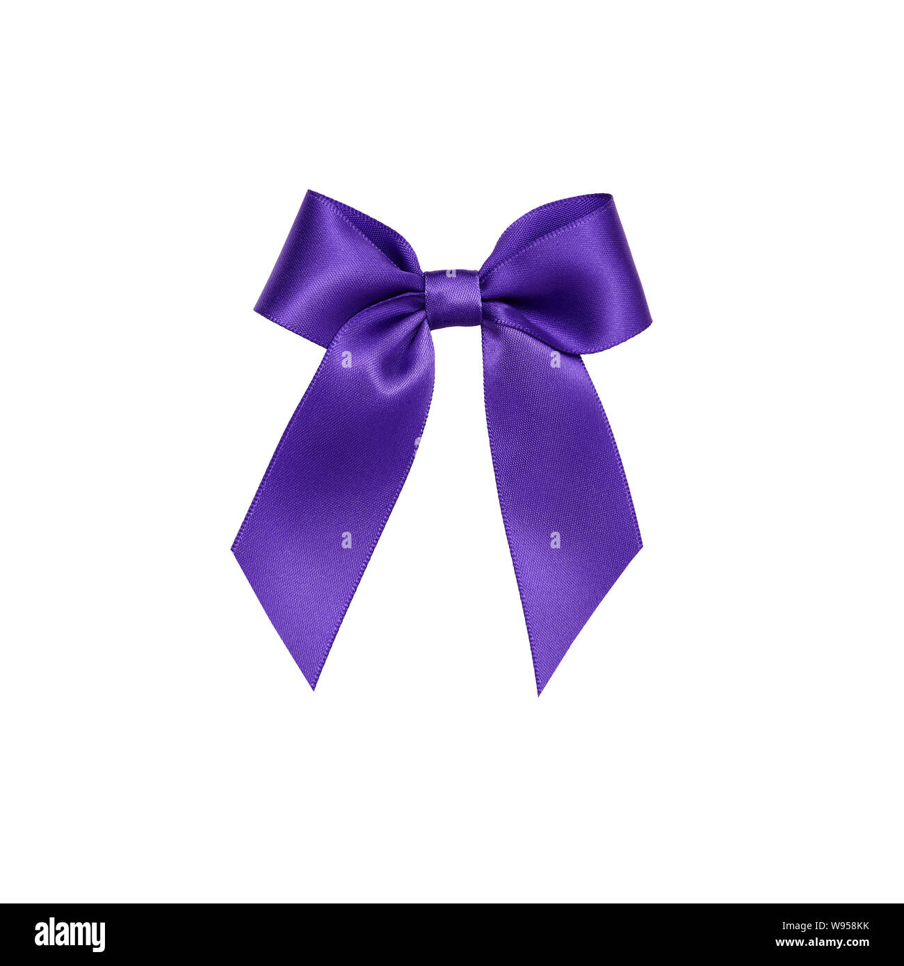 Purple ribbon bow cut out, isolated on white background Stock Photo