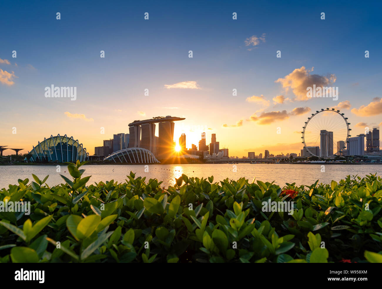 Urban downtown business buildings area at sunset in Singapore.Singapore is a world famous tourist city. Stock Photo