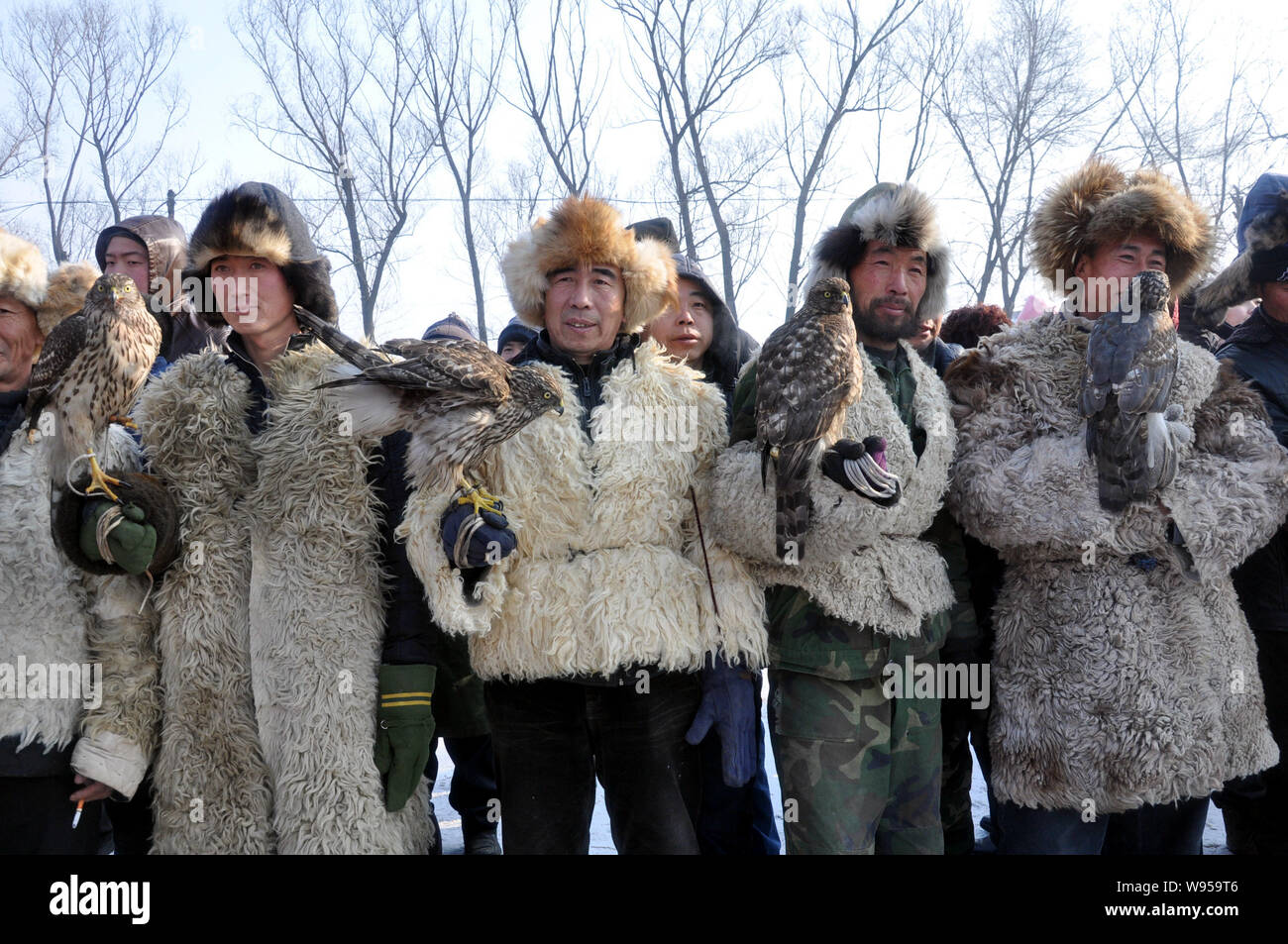 Chinese hunters show their falcons during the Second Manchu Falcon