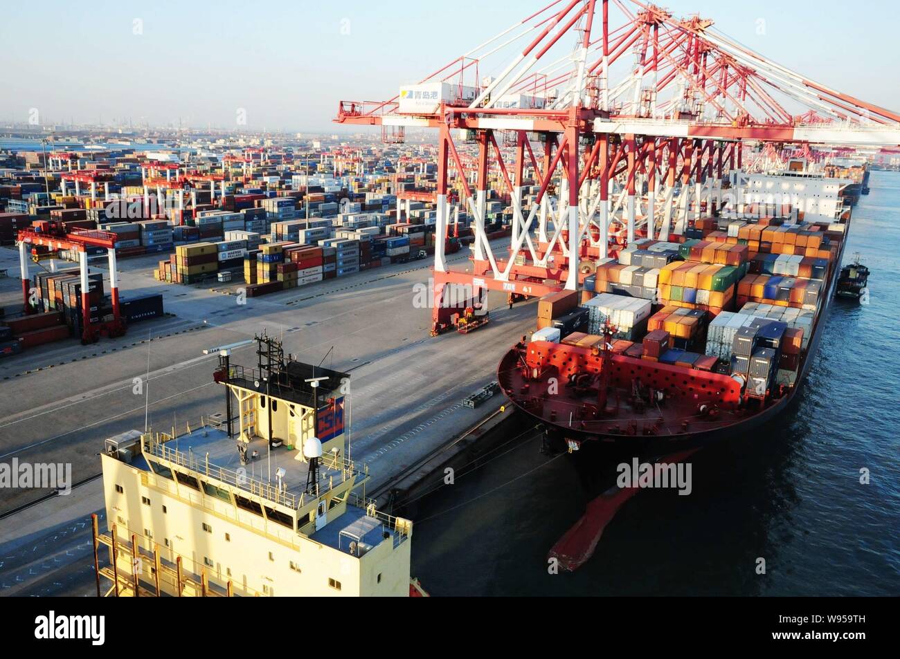 View of a container terminal in Qingdao, east Chinas Shandong province, 4 January 2012.   Chinas exports and imports grew at their slowest pace in mor Stock Photo