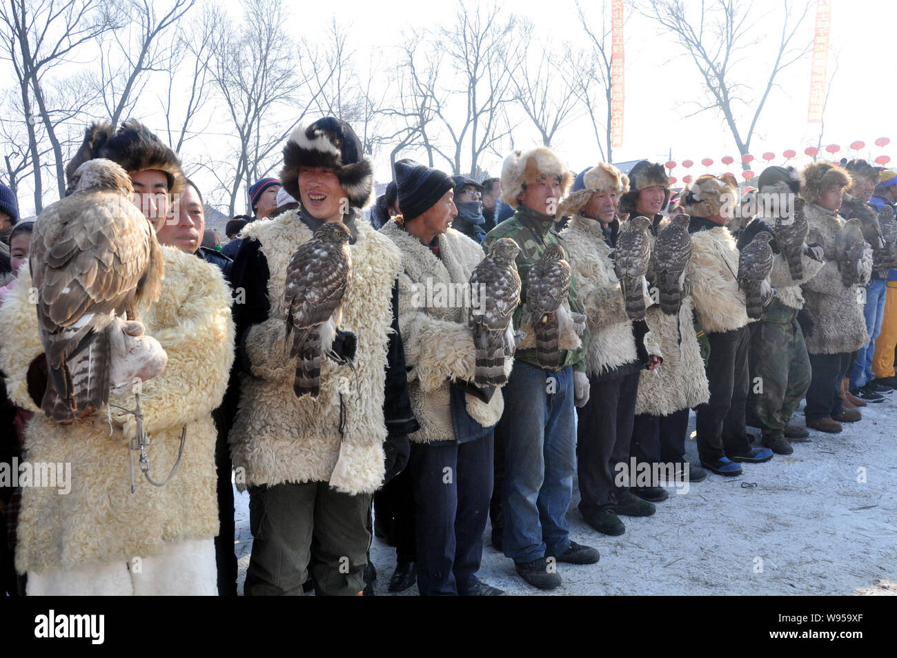 Chinese hunters show their falcons during the Second Manchu Falcon