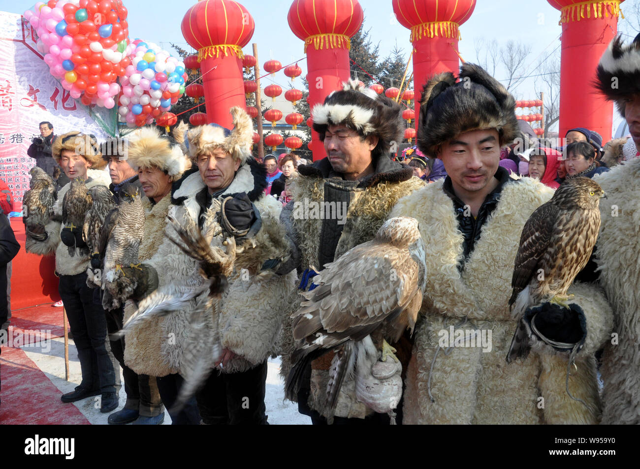 Chinese hunters show their falcons during the Second Manchu Falcon