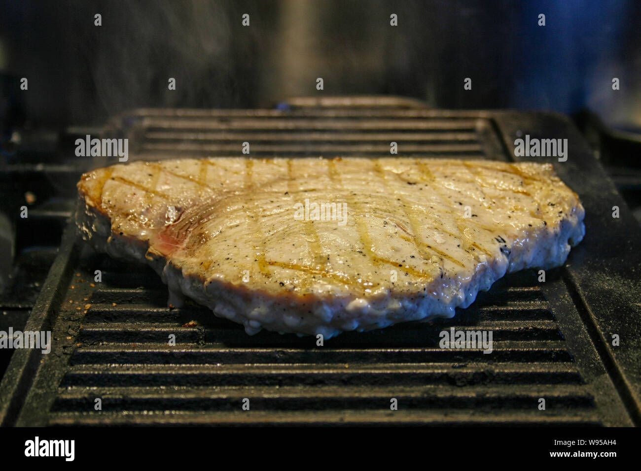 swordfish steak on grill Stock Photo Alamy