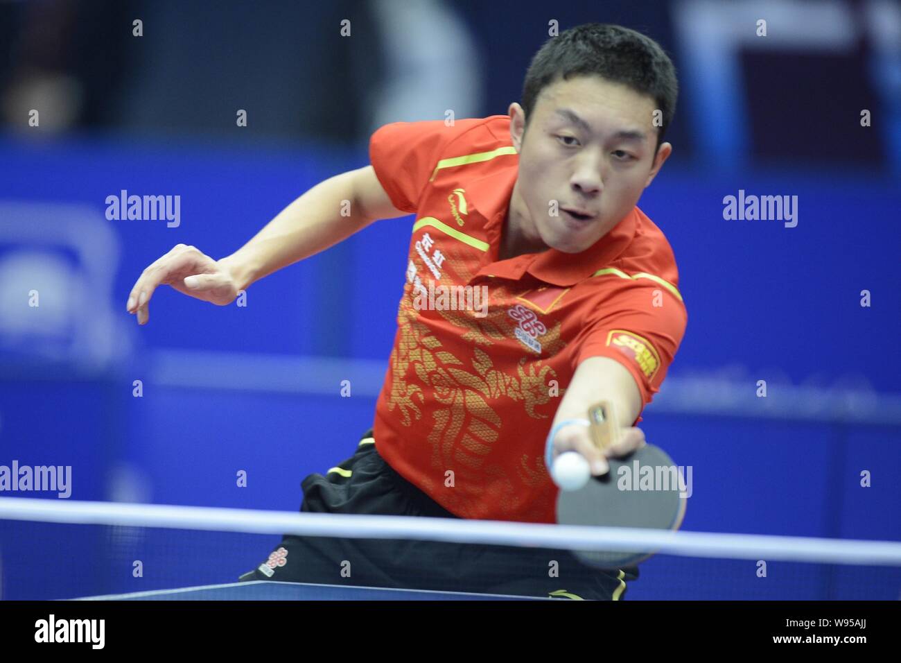 Chinese table tennis player Xu Xin competes during the mens single