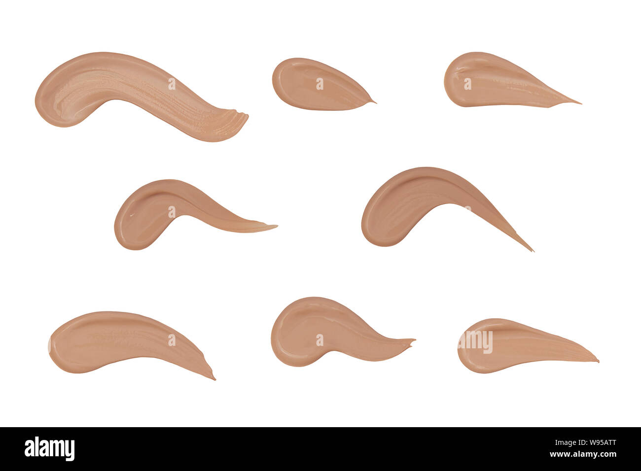 Makeup foundation cream smears isolated and cut out on white background Stock Photo