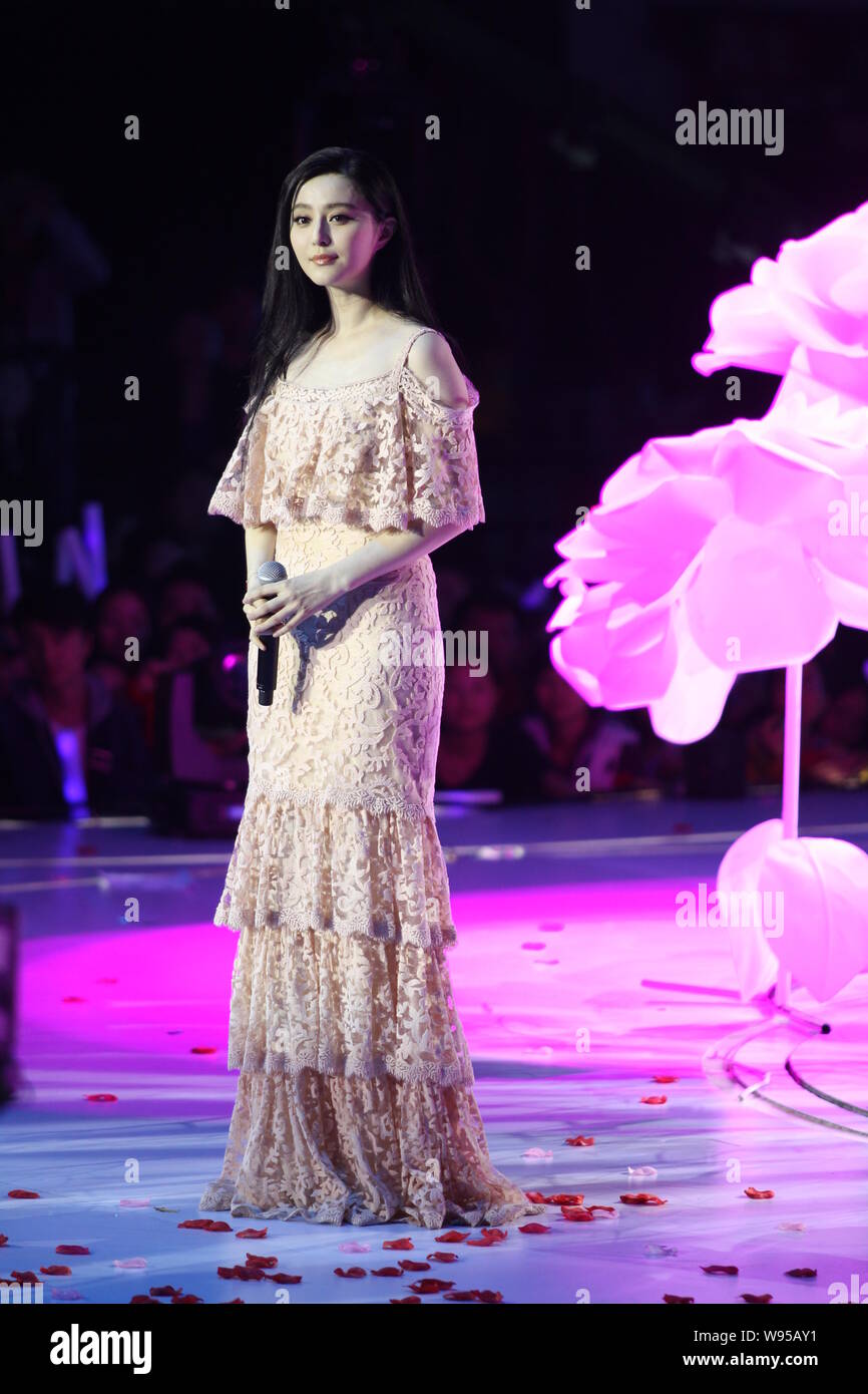 Chinese actress Fan Bingbing poses on the stage of New Year Celebration rehearsal in Shenzhen, Guangzhou, 18 December 2012. Stock Photo