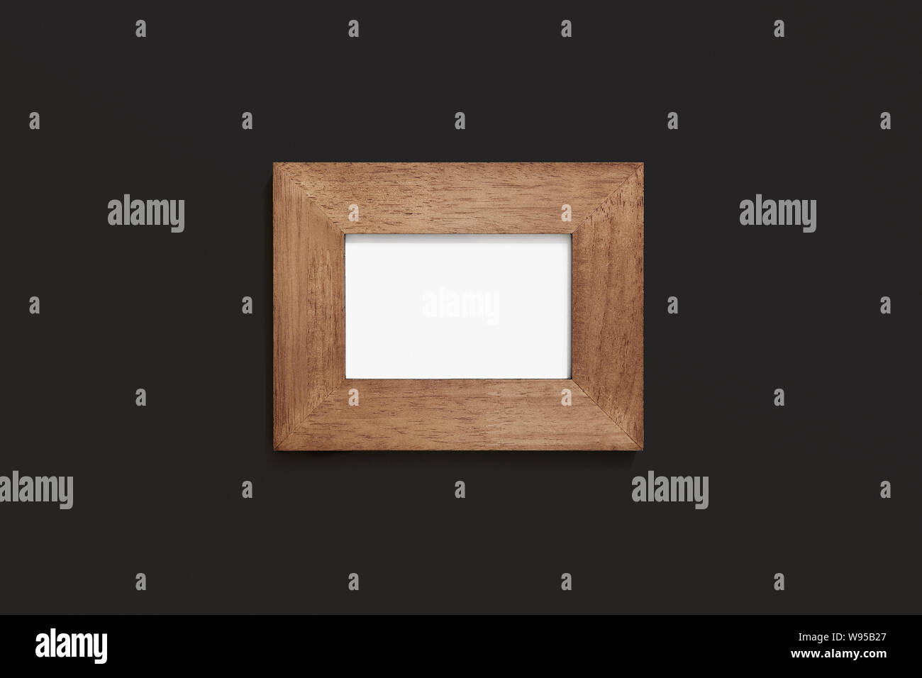 Blank frame mock up on black background, empty picture template flat lay Stock Photo