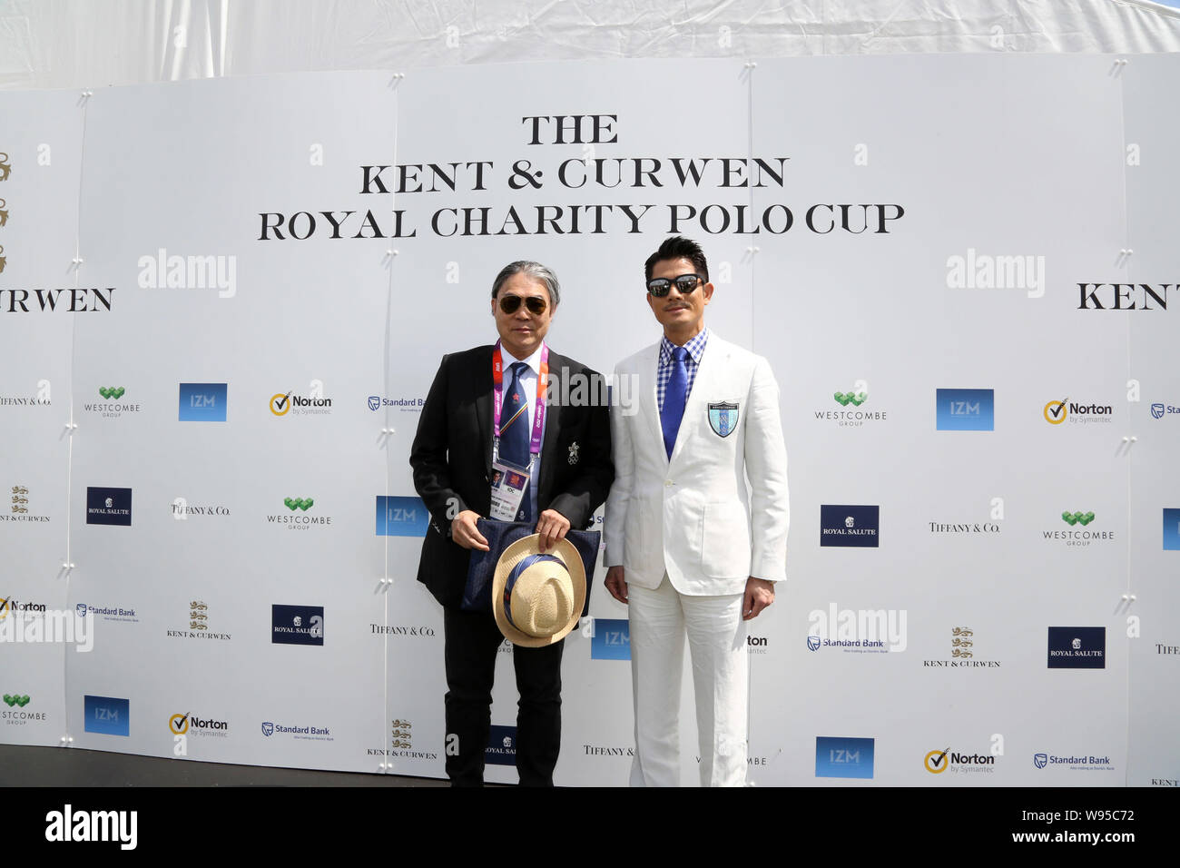 Hong Kong singer and actor Aaron Kwok (R) and Member of the Legislative