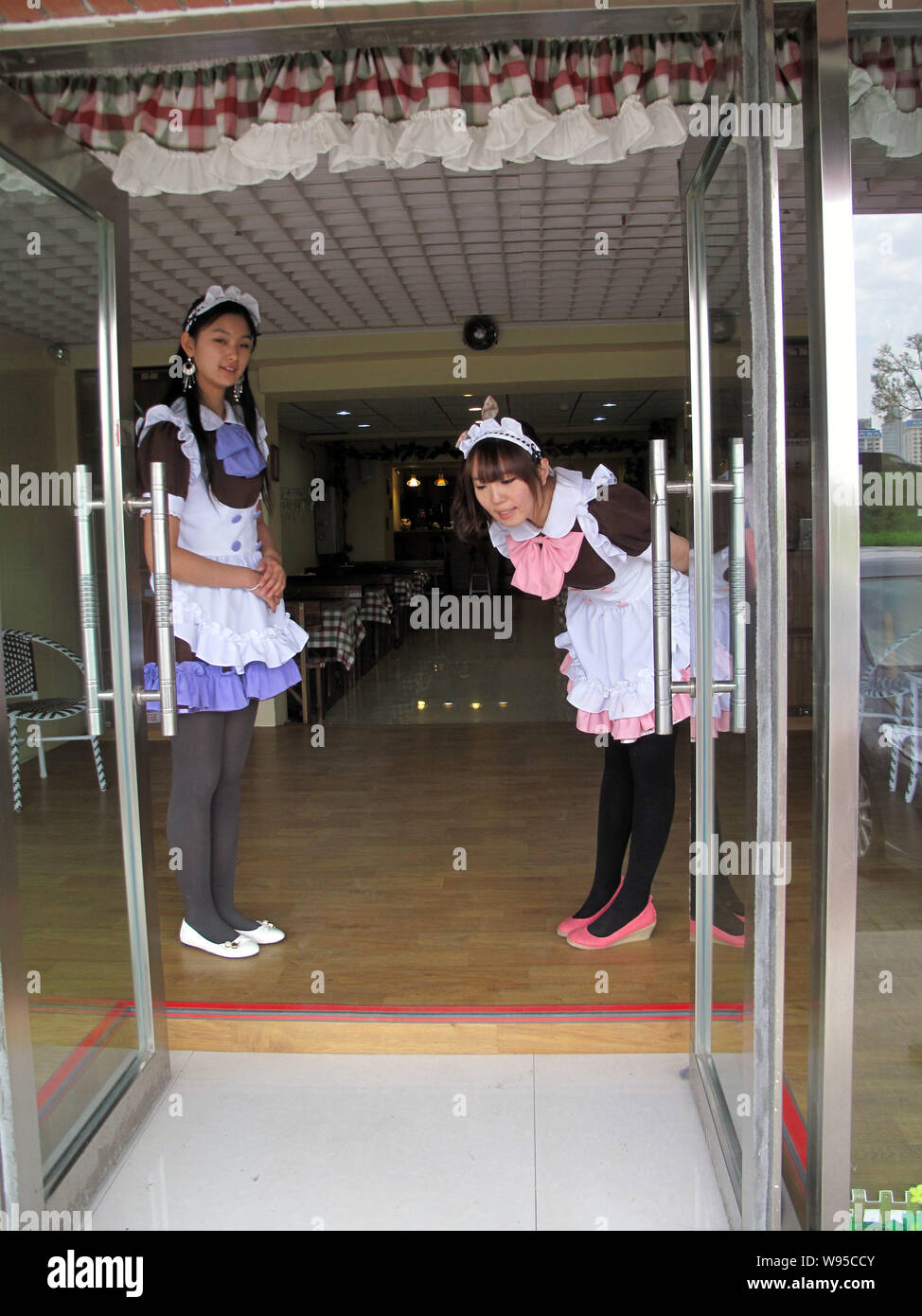 Maid uniforms hires stock photography and images Alamy