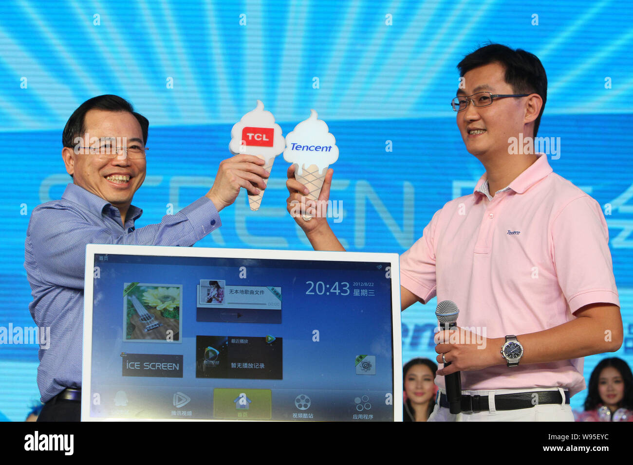Pony Ma (Ma Huateng), right, Chairman and CEO of Tencent, and Li Dongsheng, left, Chairman of TCL, pose at a launch ceremony for the TCL smart TV, iCE Stock Photo