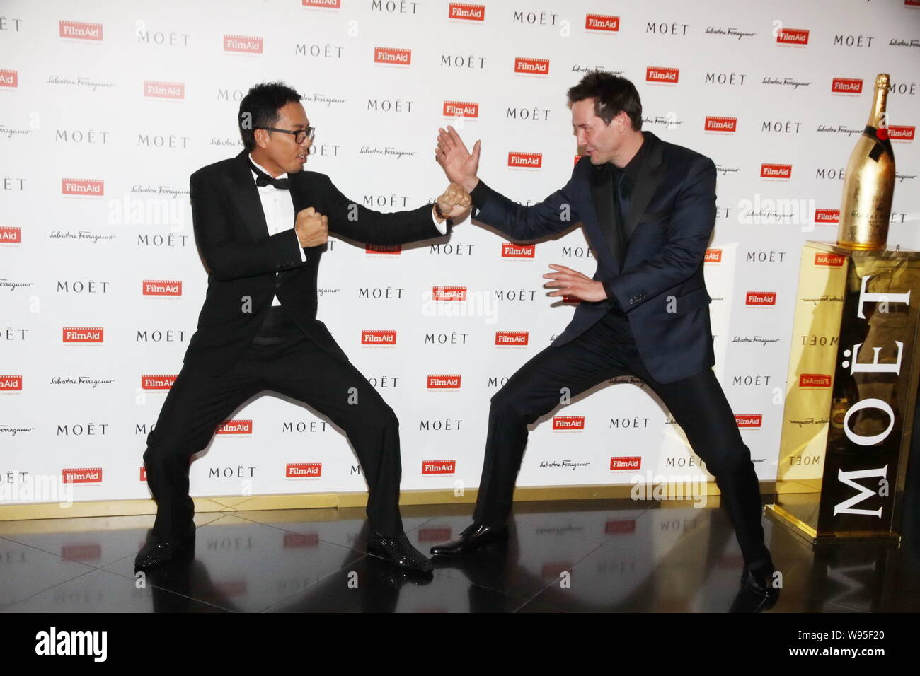 Canadian actor Keanu Reeves (R) and Hong Kong actor Donnie Yen pose Canadian actor Keanu Reeves (R) and Hong Kong actor Donnie Yen pose