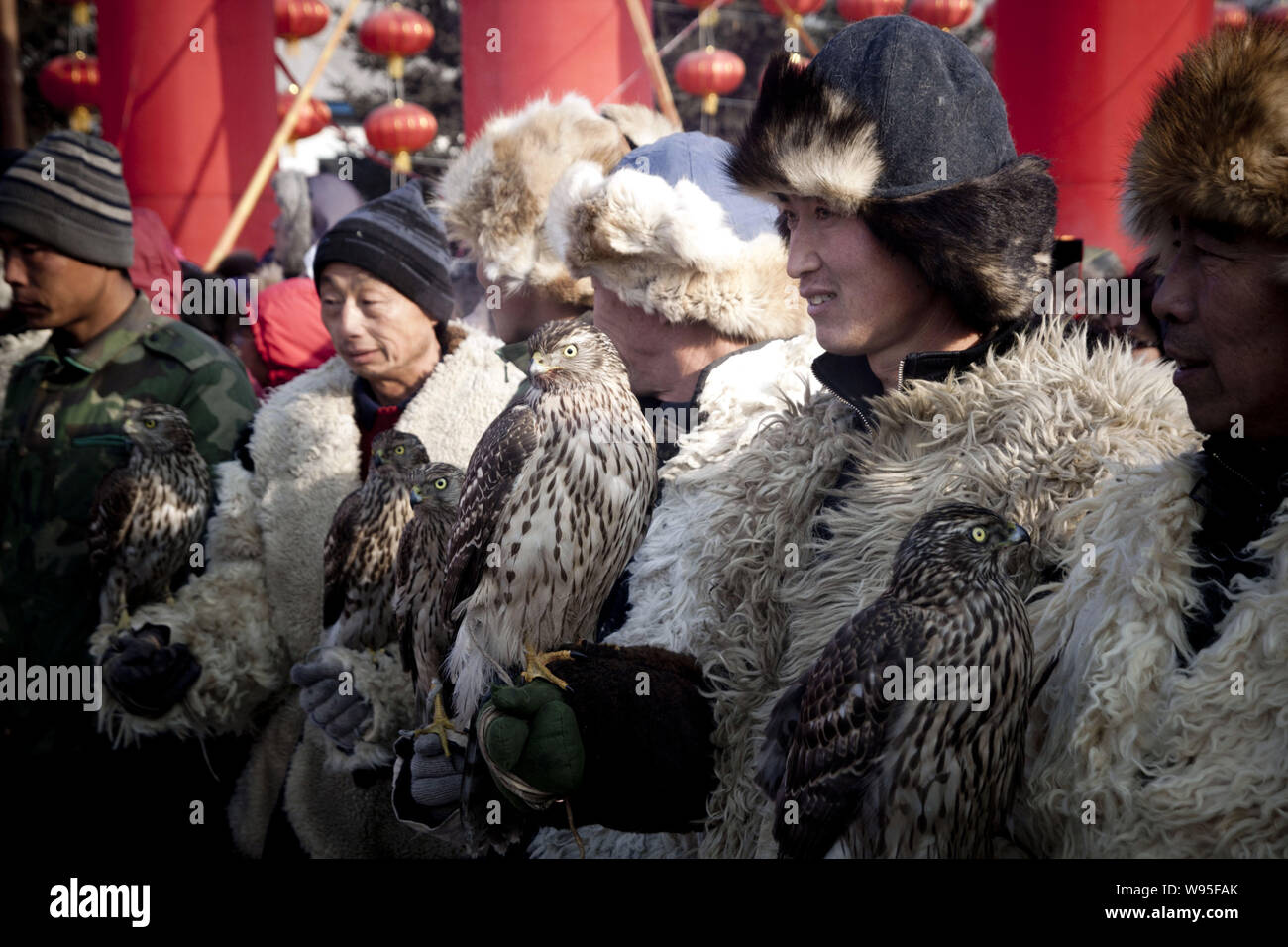 Chinese hunters show their falcons during the Second Manchu Falcon