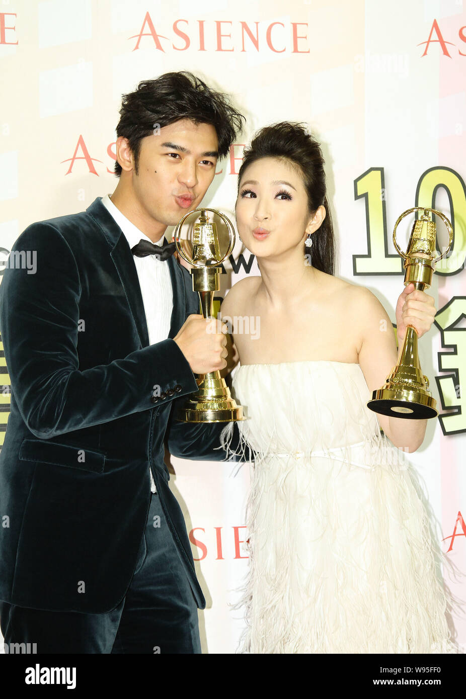 Taiwanese singer and actress Ariel Lin, right, and actor Berlin Chen ...