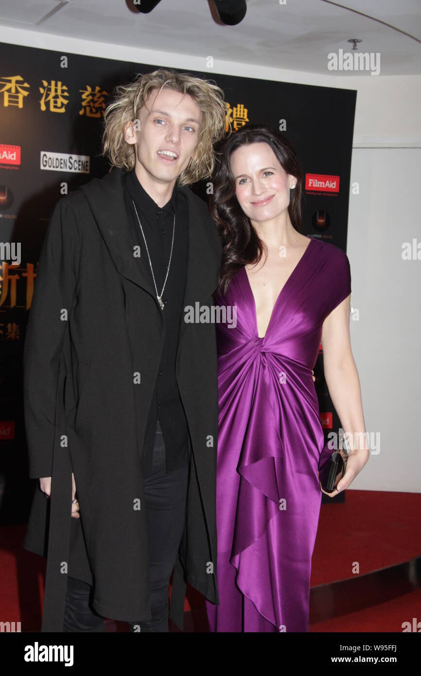 U.S. actress Elizabeth Reaser, right, poses with English actor Jamie Campbell Bower during a charity premiere of the movie, The Twilight Saga: Breakin Stock Photo