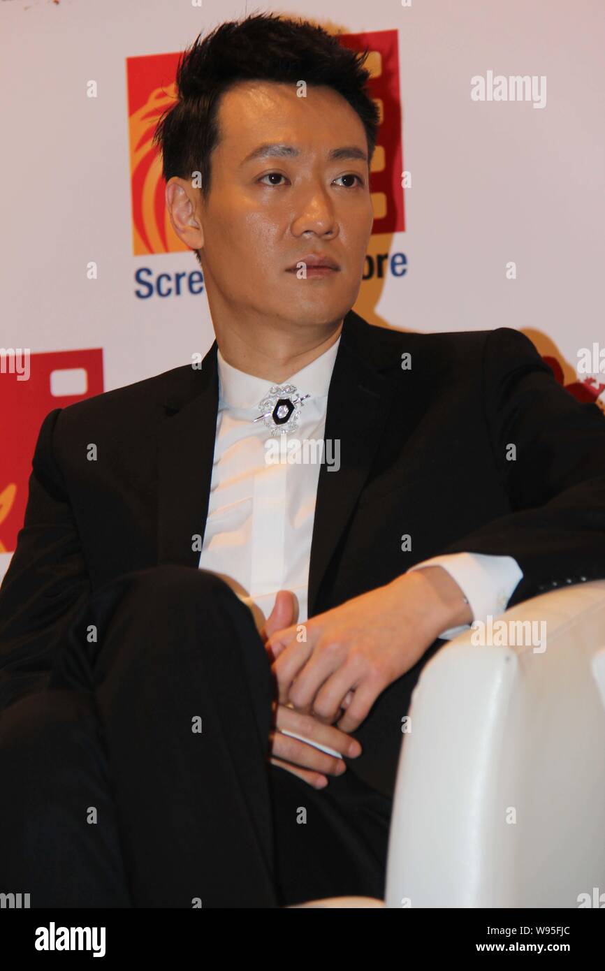 Chinese actor Xin Baiqing attends a press conference for his latest movie,The Last Tycoon, in Singapore, 4 December 2012. Stock Photo