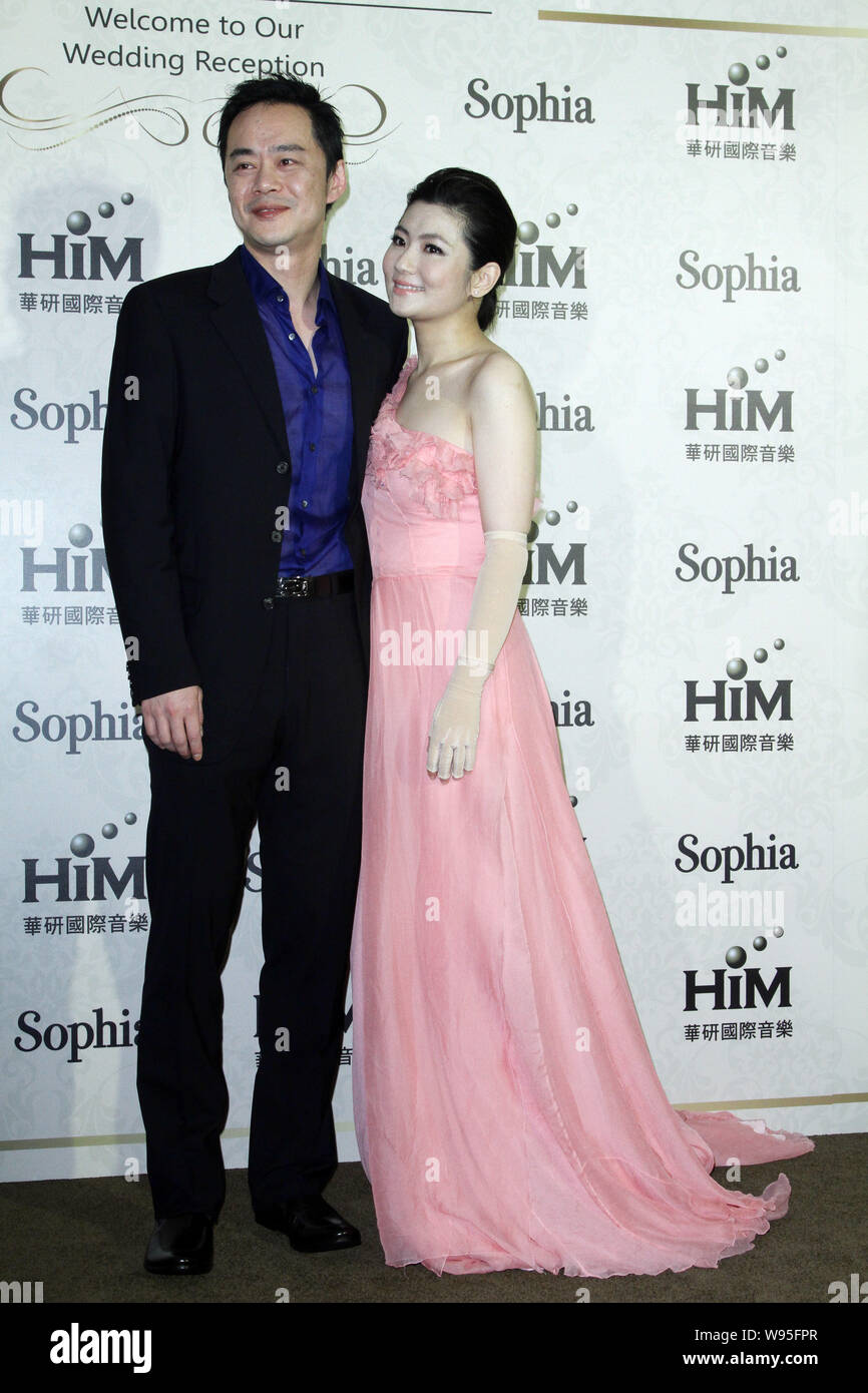 Selina Jen of Taiwanese girl group S.H.E and her husband Richard Chang pose during a wedding ceremony for S.H.E member Ella Chen and Malaysian busines Stock Photo