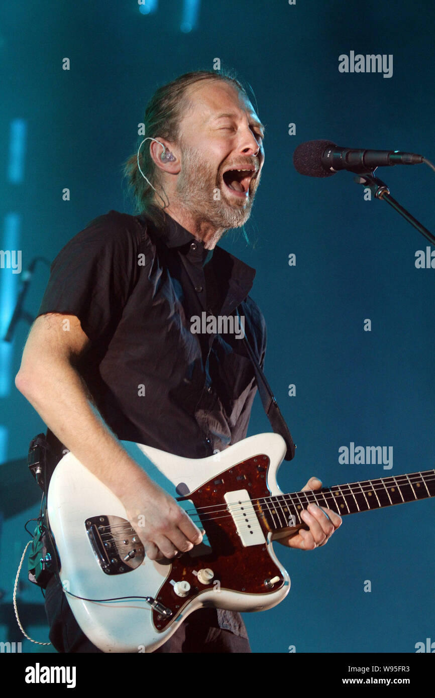 Lead singer of British rock band Radiohead, Thom Yorke, performs during their concert in Taipei, Taiwan, 25 July 2012. Stock Photo