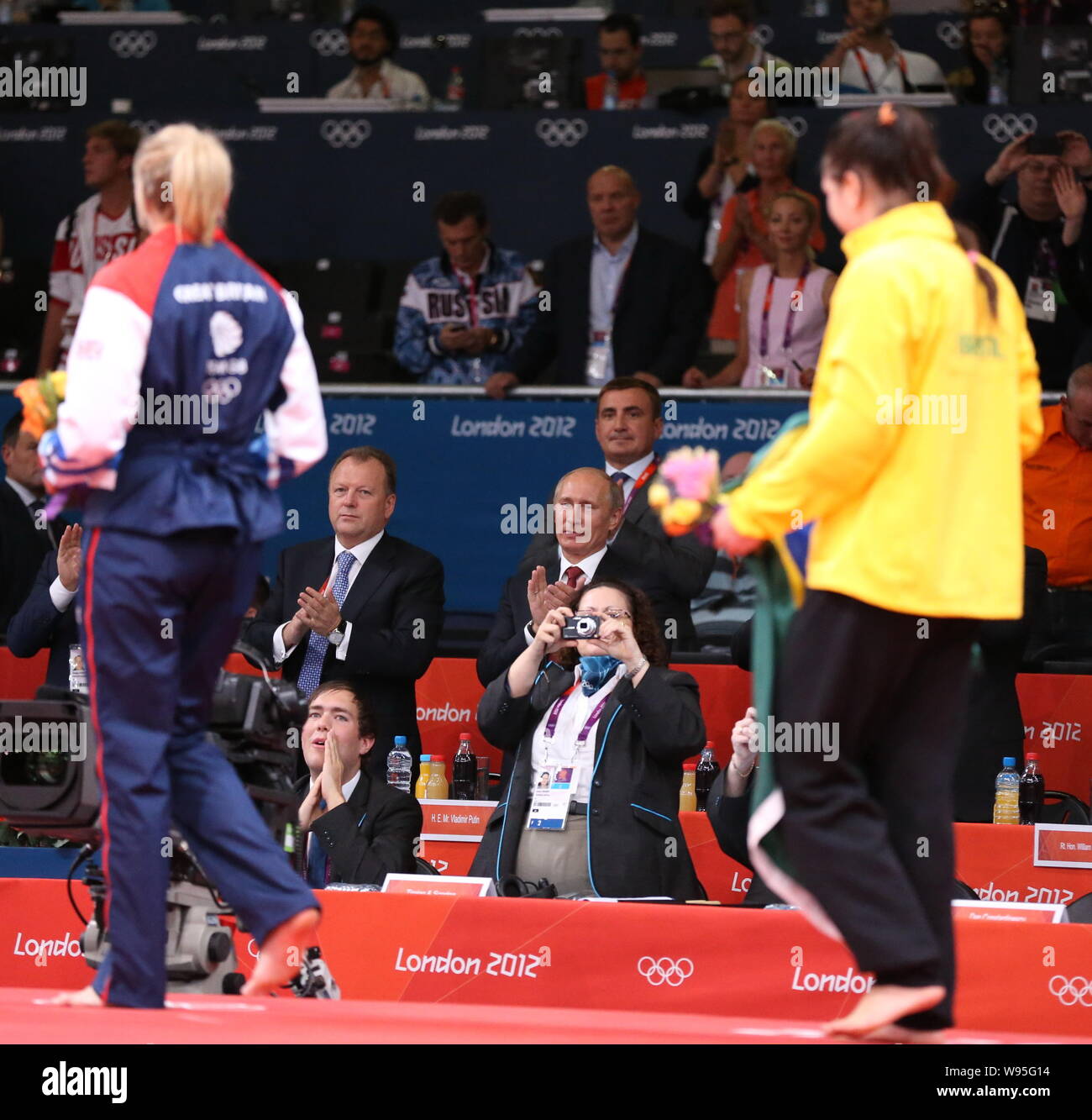 Russian President Vladimir Putin, center, is pictured in the final of a womens judo competition during the London 2012 Olympic Games in London, UK, 2 Stock Photo
