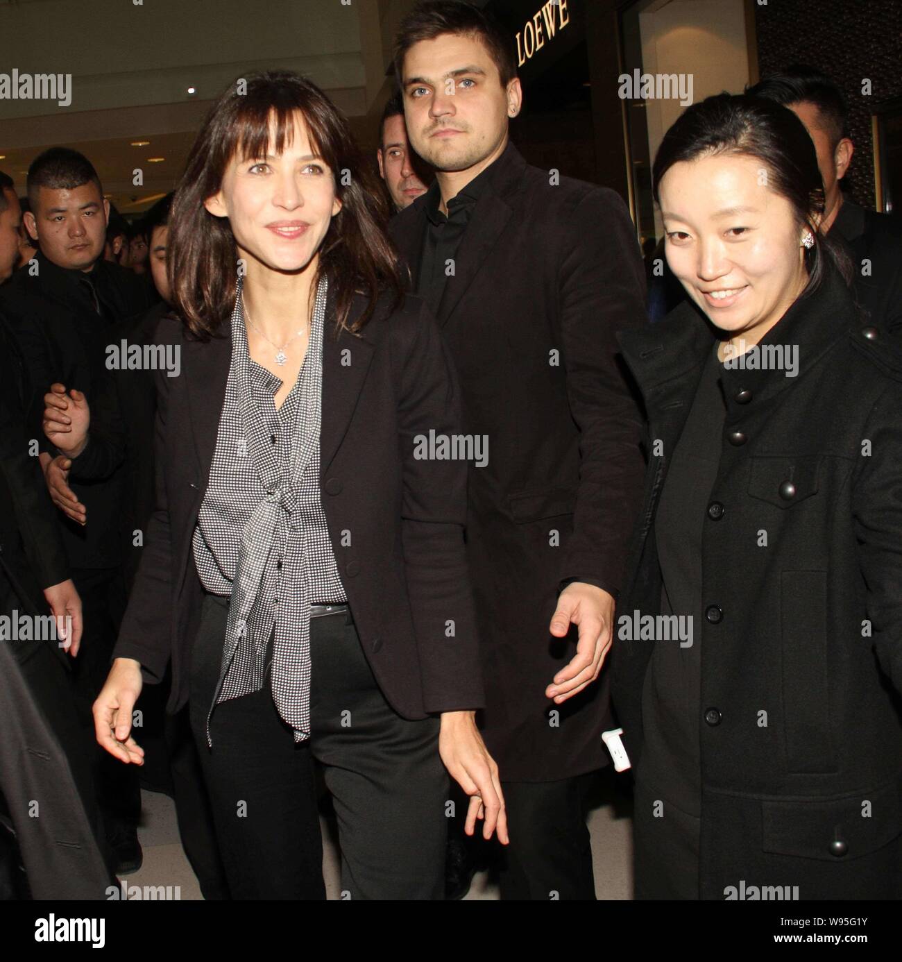 French actress Sophie Marceau (center) attends the opening ceremony for the  jewellery boutique of Chaumet at Grand Gateway Shanghai, China, 30 Novembe  Stock Photo - Alamy