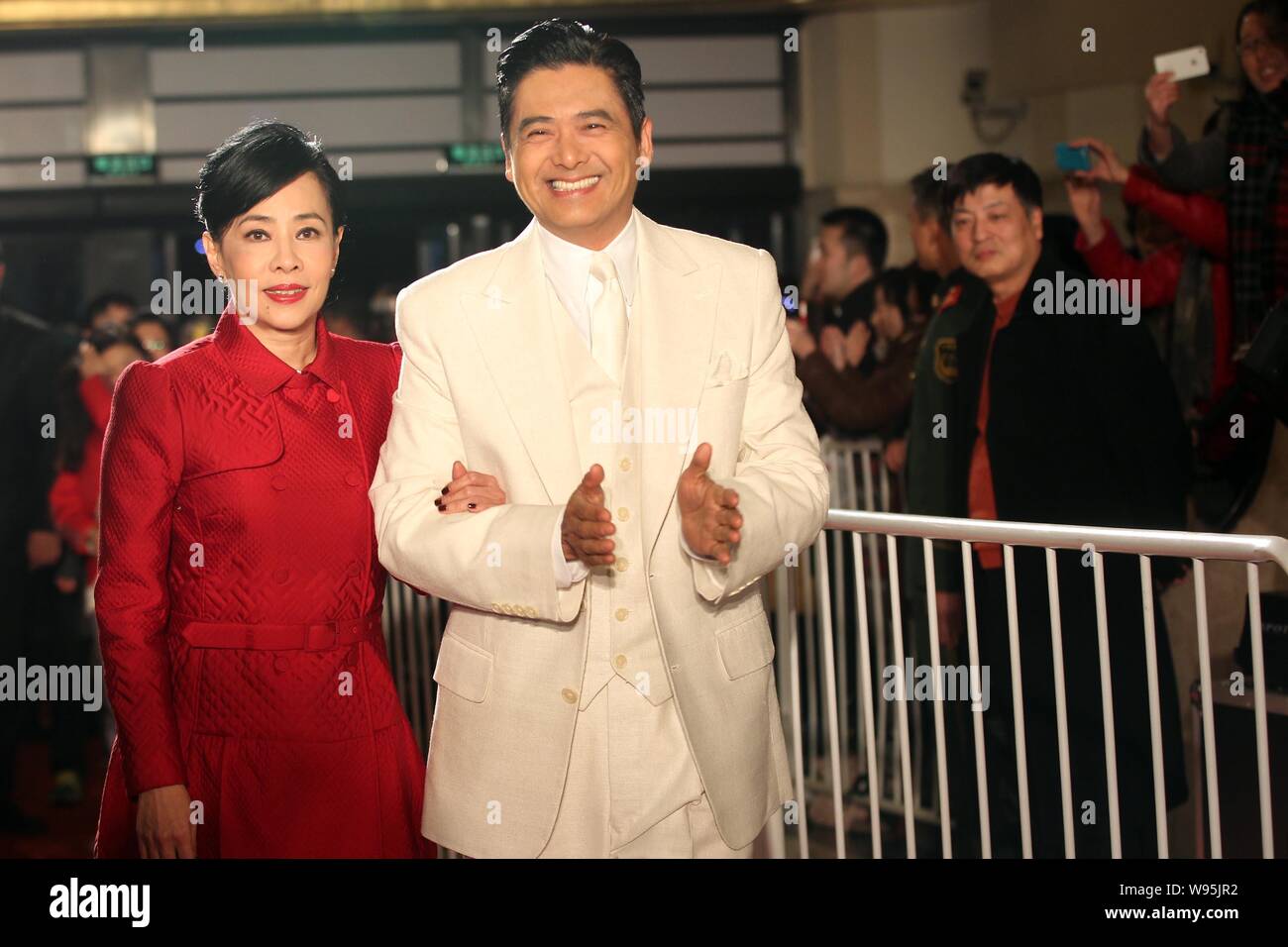 Hong Kong actor Chow Yun-fat, right, and his wife Jasmine Tan arrive