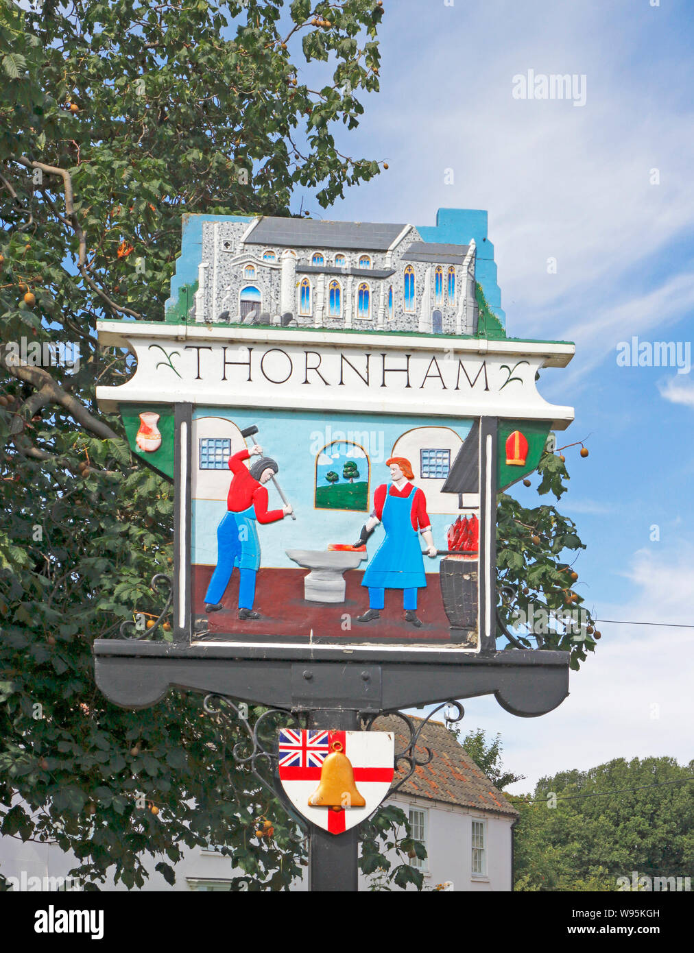 A view of the east side of the village sign on the A149 coast road in North Norfolk at Thornham, Norfolk, England, United Kingdom, Europe. Stock Photo