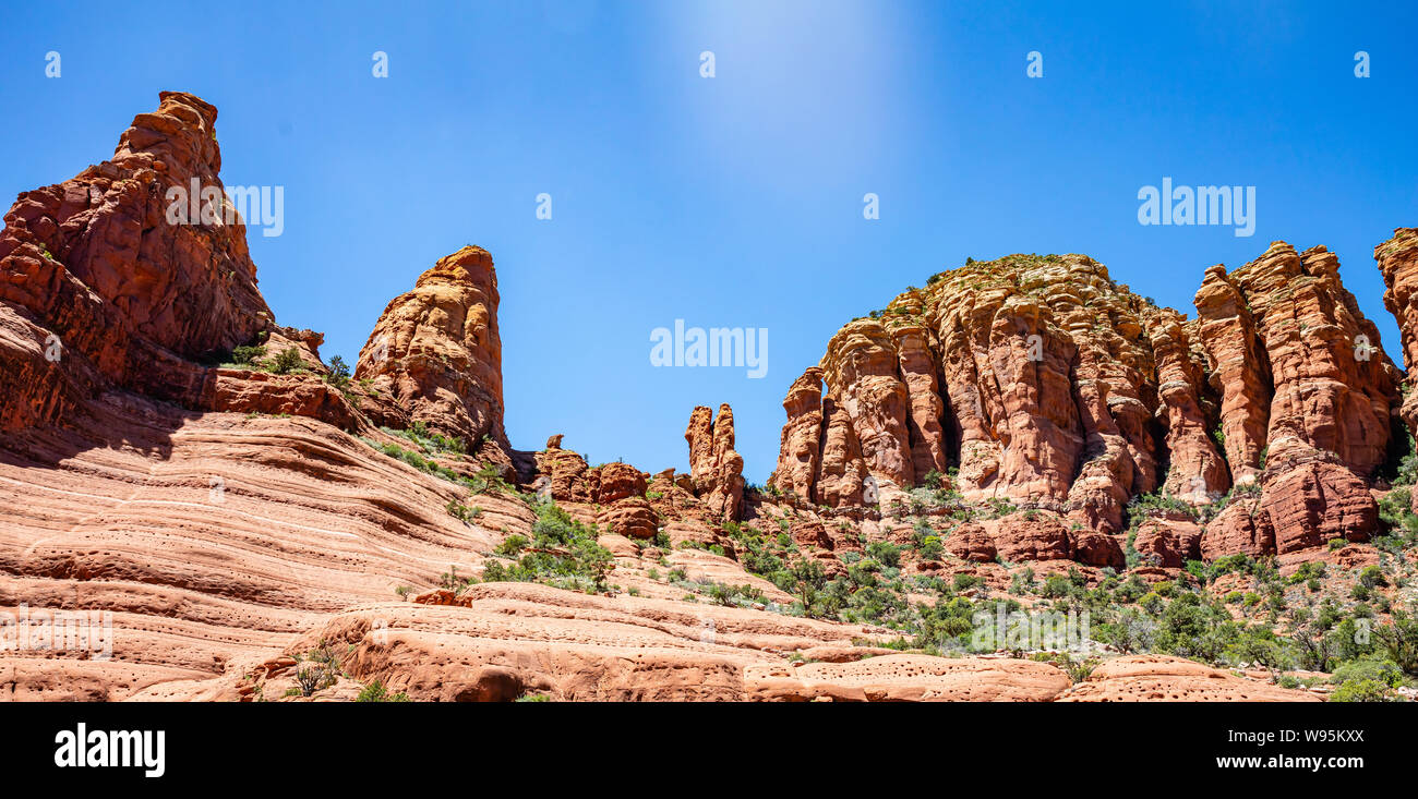 Sedona Arizona southwest US of America. Red orange color rock formations, desert sandstone landscape, clear blue sky, sunny spring day Stock Photo