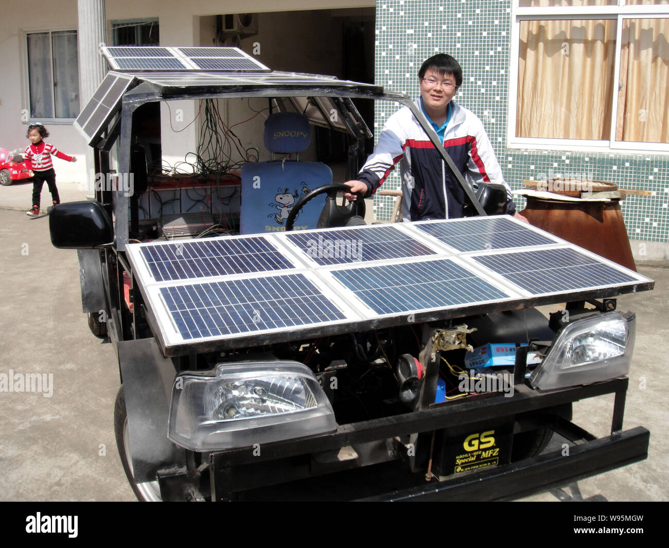 19 year old Chinese student Zhu Zhenlin poses with his homemade