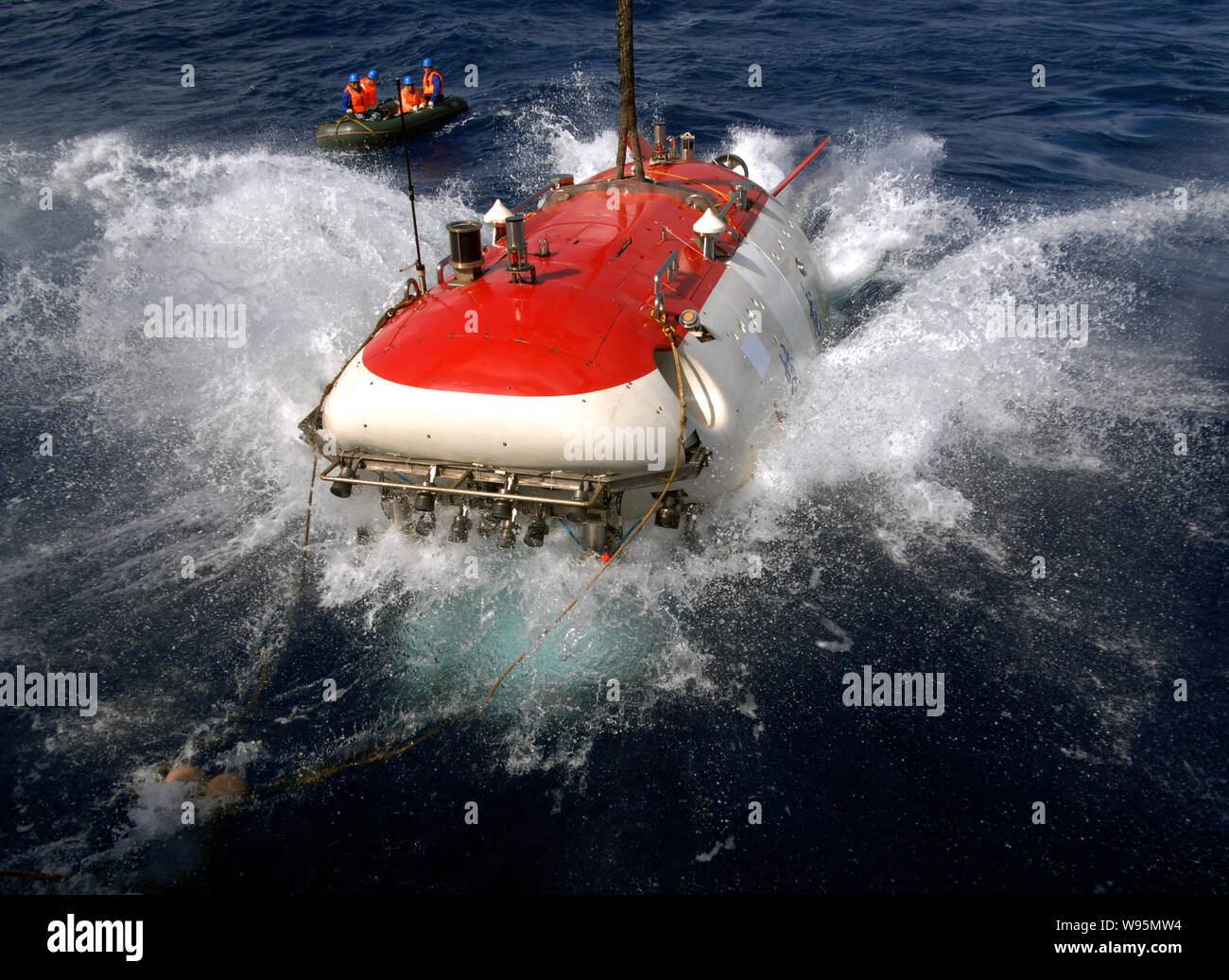 --FILE--The manned submersible Jiaolong is being put into water in the Pacific Ocean, 31 July 2011.   Chinas manned deep-diving submersible, the Jiaol Stock Photo