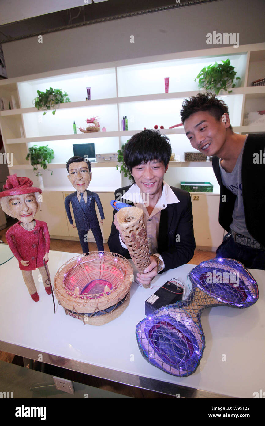 Chinese Hairstylist Huang Xin Left Displays His Hair Made