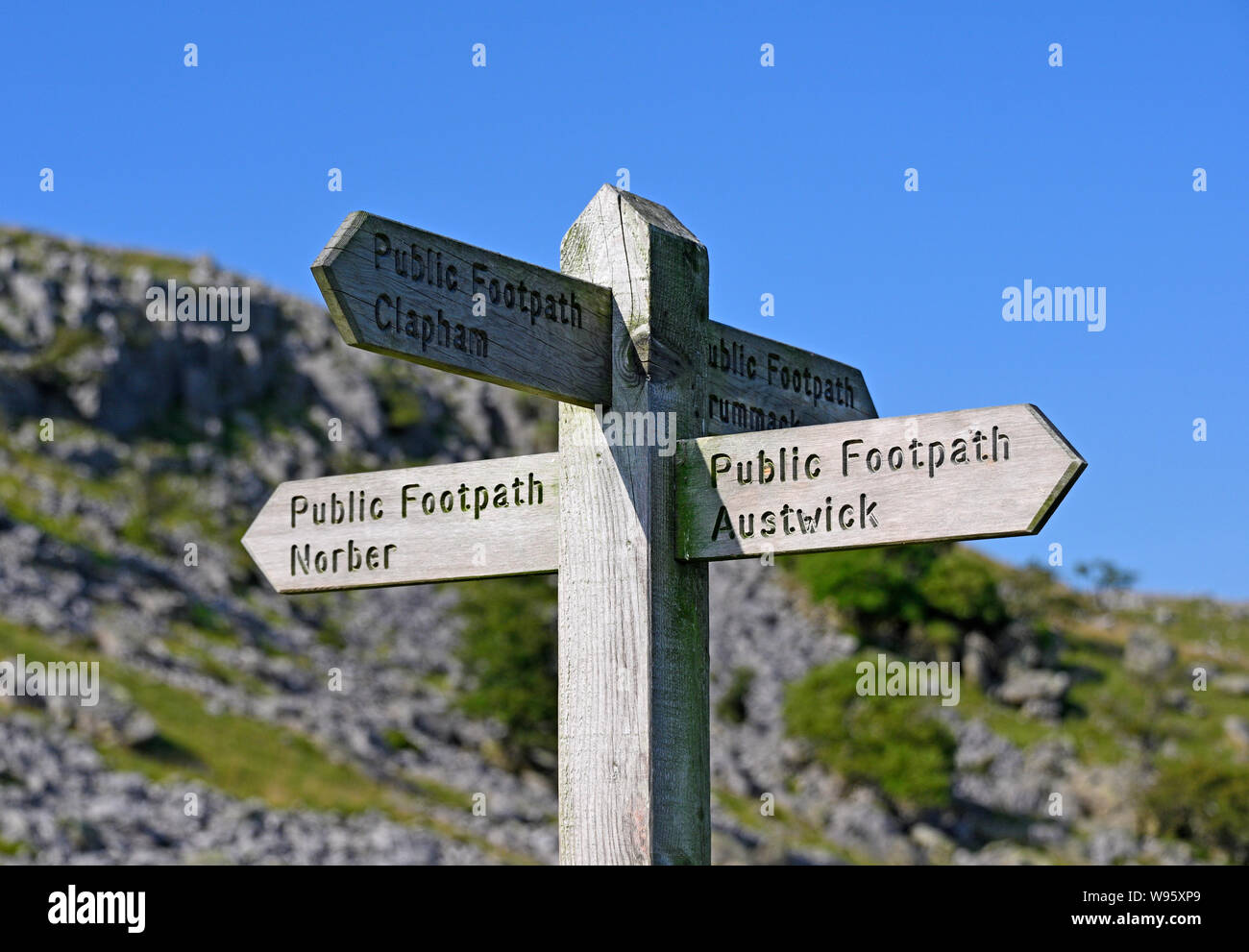 Public Footpath Direction fingerpost. Norber. Austwick, Yorkshire Dales National Park, Craven, North Yorkshire, England, United Kingdom, Europe. Stock Photo