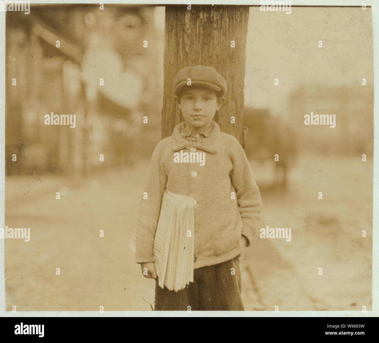 Alfred Genalano - 12 Newark Street. 10 yrs. old - Carries to customers on River Street, in Segregated district - Dunno how many. 3:30 P.M. Abstract: Photographs from the records of the National Child Labor Committee (U.S.) Stock Photo